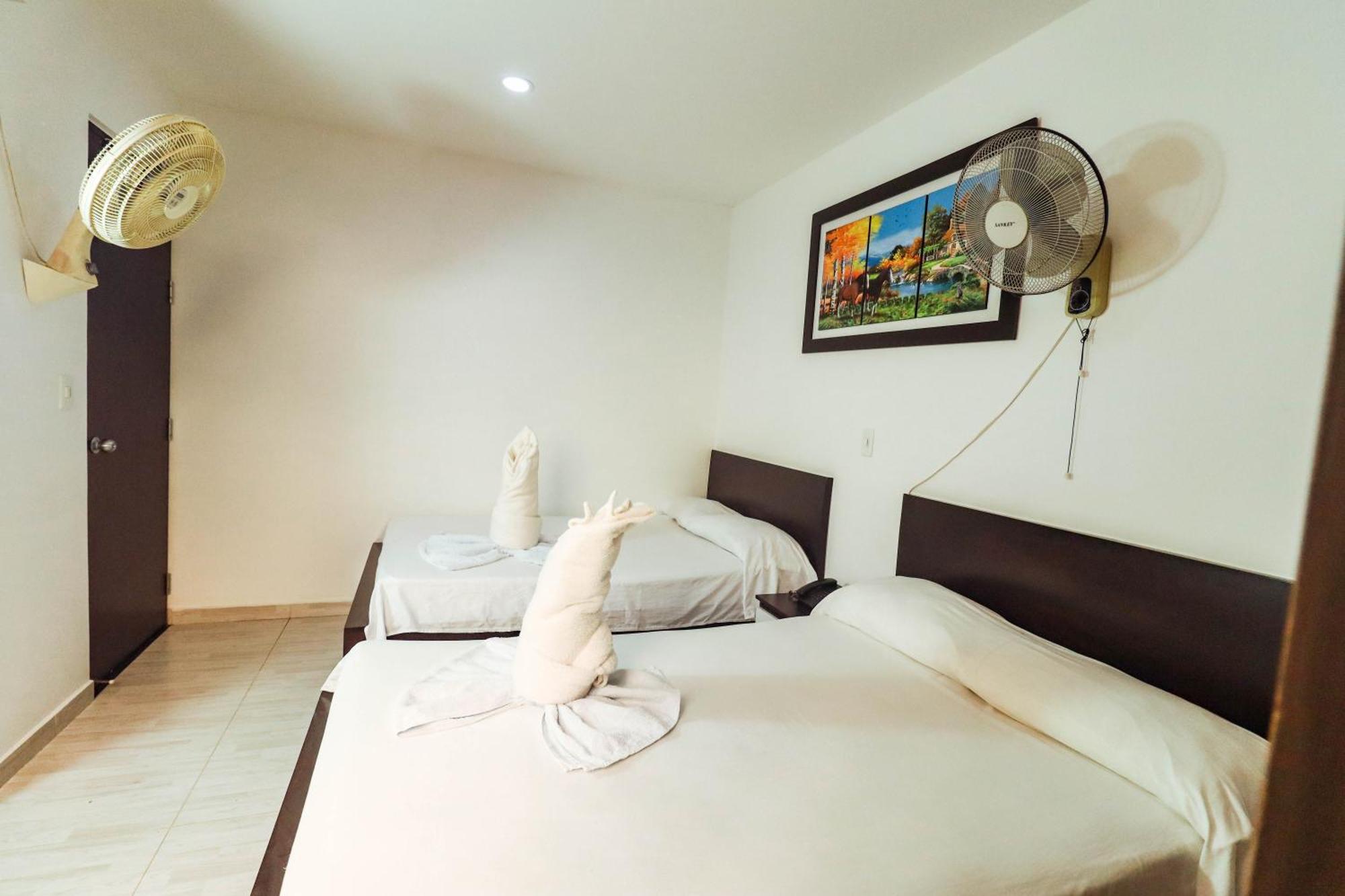 Hotel California Air Carepa Номер фото