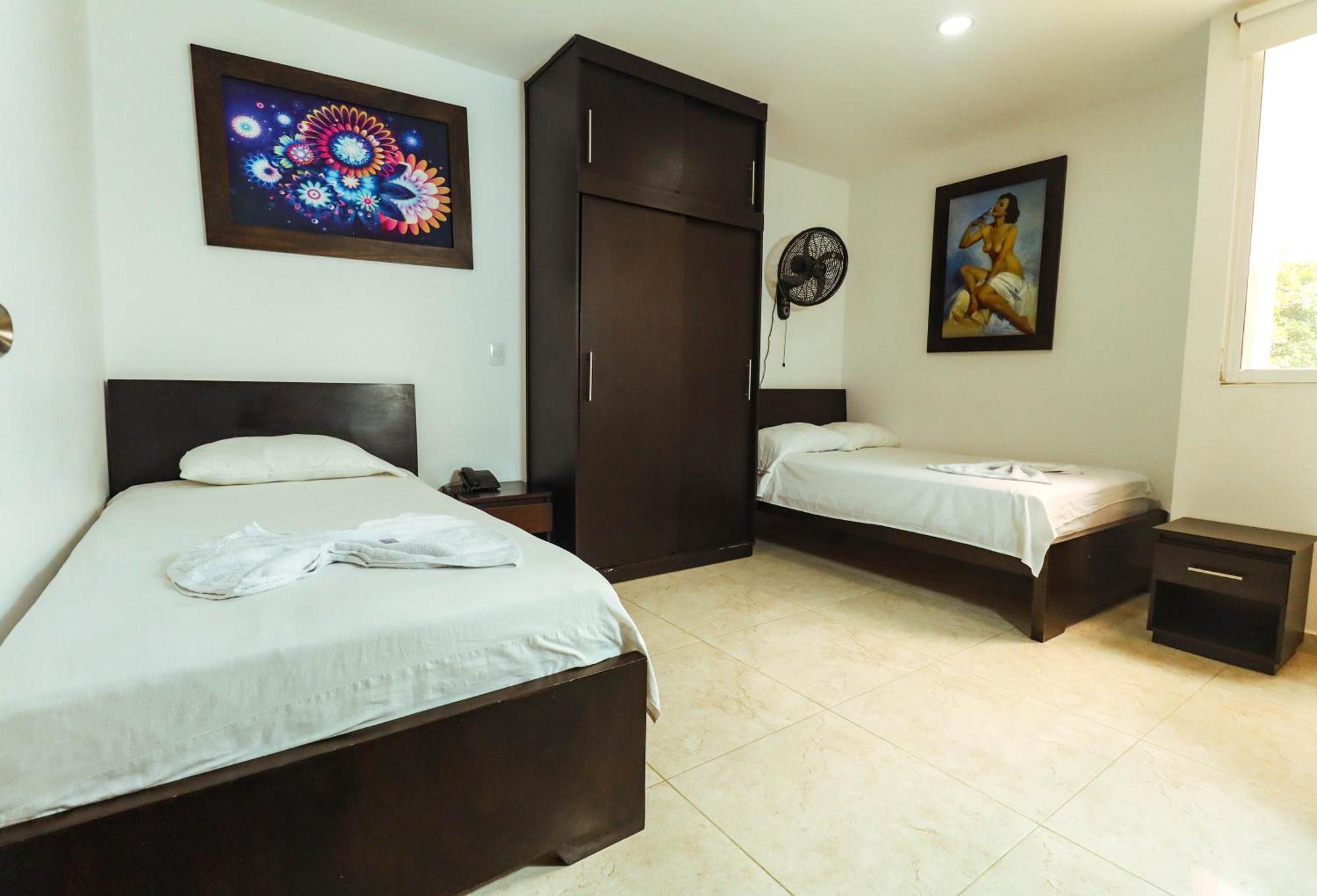 Hotel California Air Carepa Номер фото