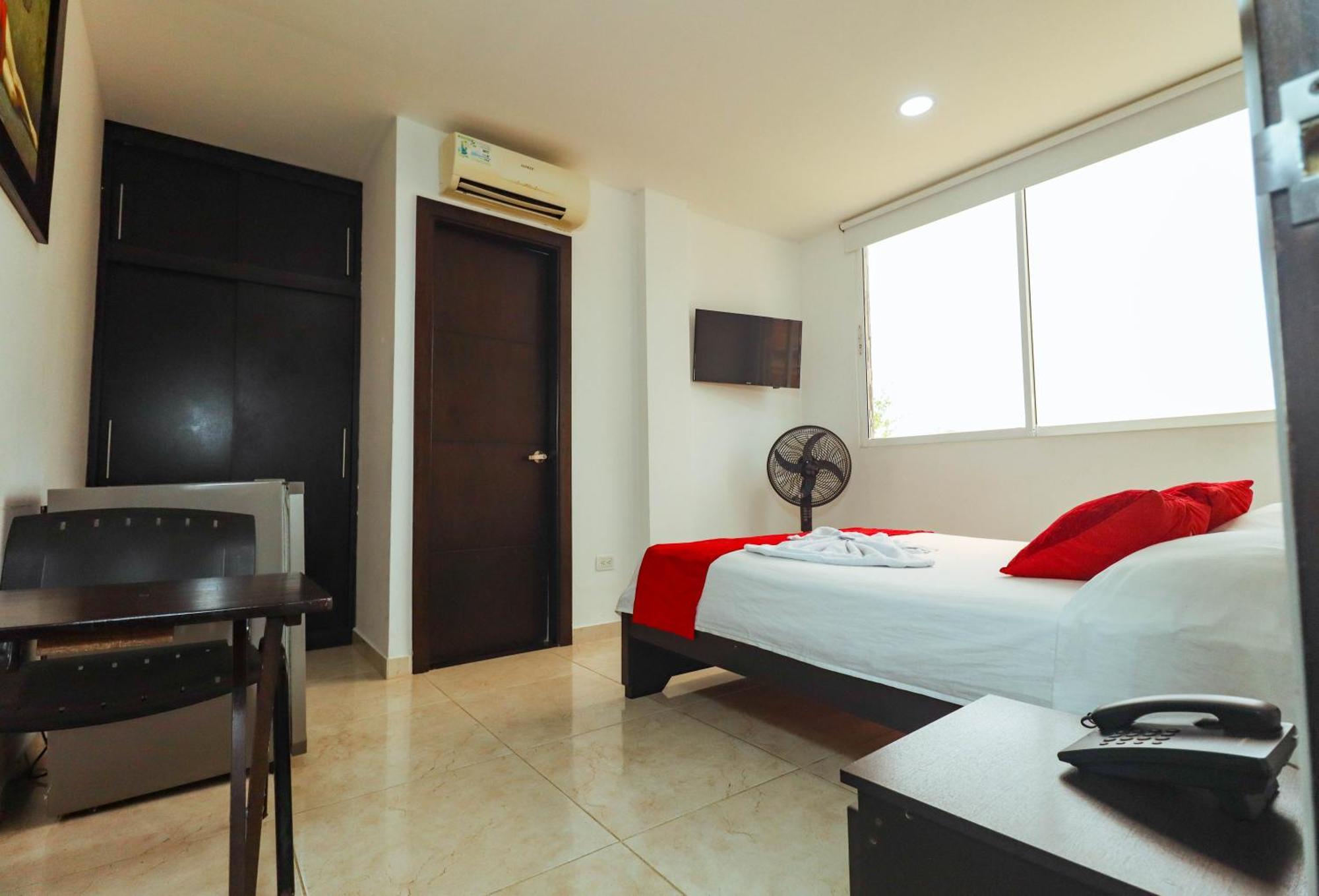 Hotel California Air Carepa Номер фото
