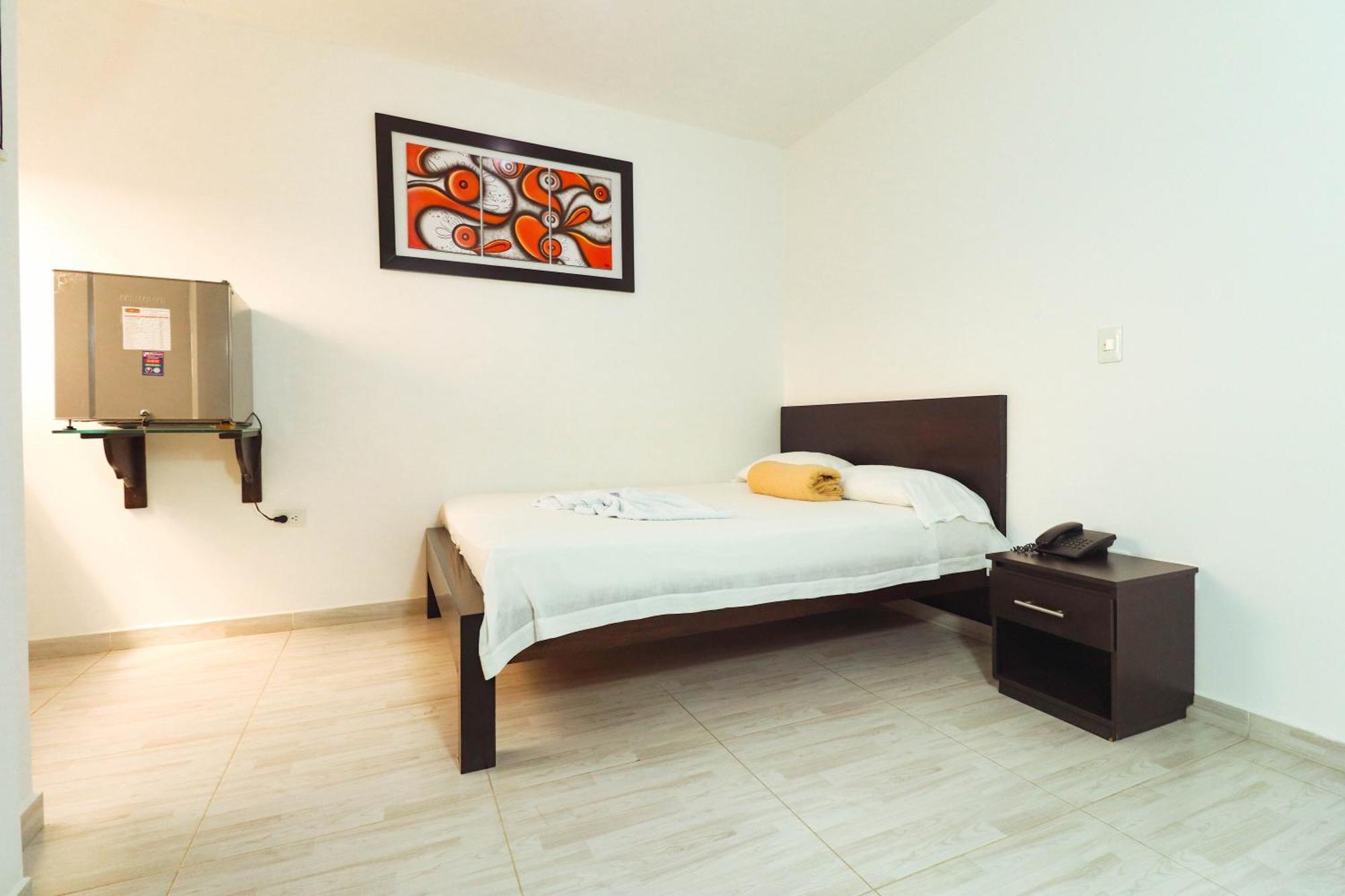 Hotel California Air Carepa Номер фото